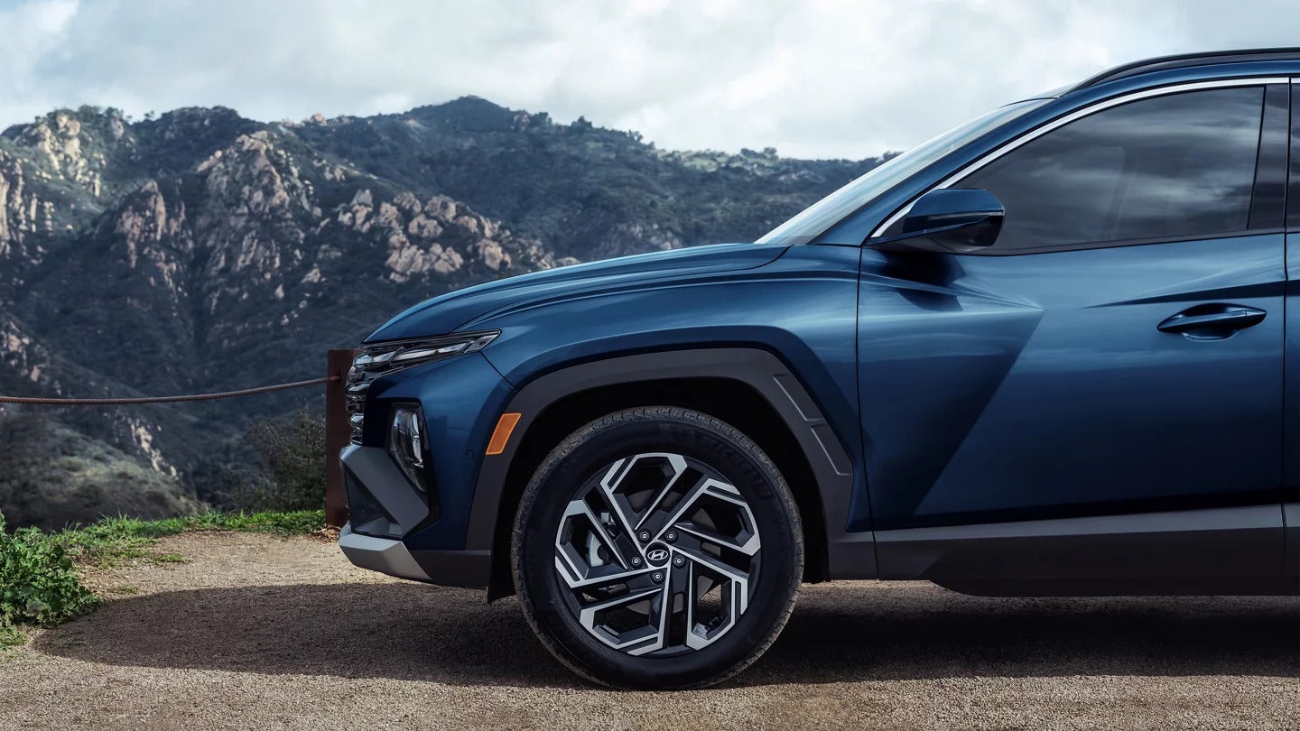 Half of Hyundai Tucson by Mountains